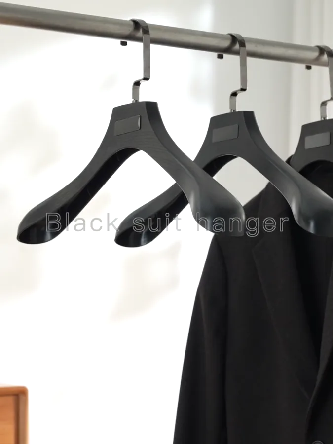 Plastic Suit Hangers with Wood Grain for a Taizhou Suit Store — 1