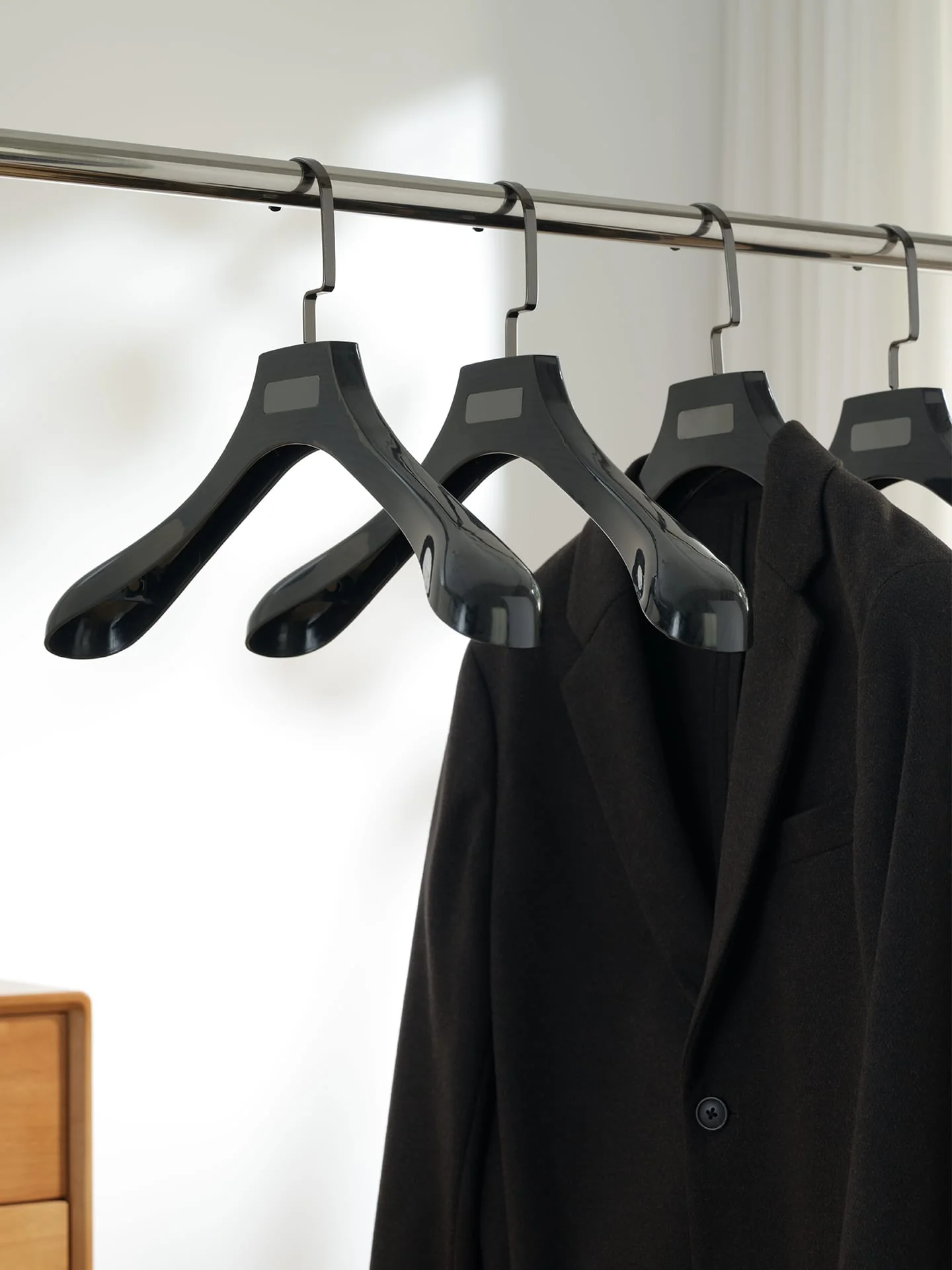 Glossy Black Wood Grain Plastic Hangers